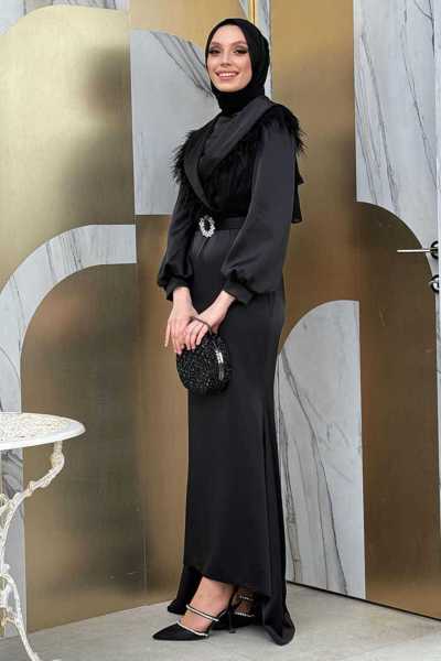 Black satin evening dress with fur train and belt accessory